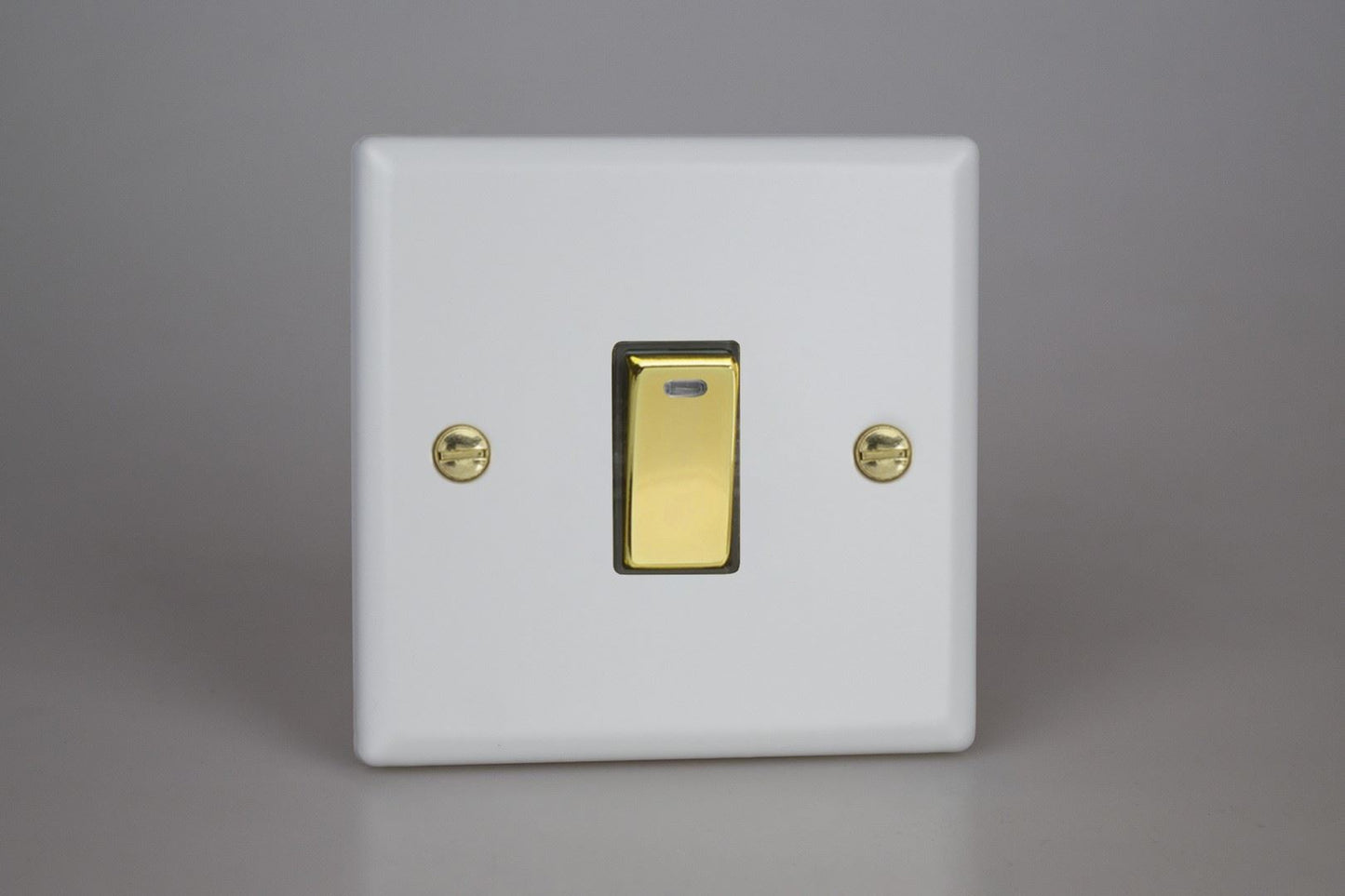 Varilight 1-Gang 20A Double Pole Rocker Switch + Neon Indicator Light in Vogue Matt White w/ Polished Brass